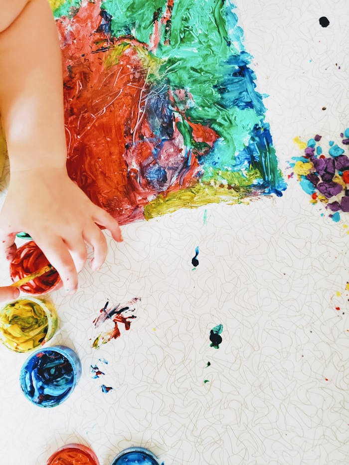 Close-Up Shot of a Person Holding a Paint